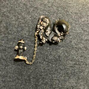 Poodle brooch with fire hydrant